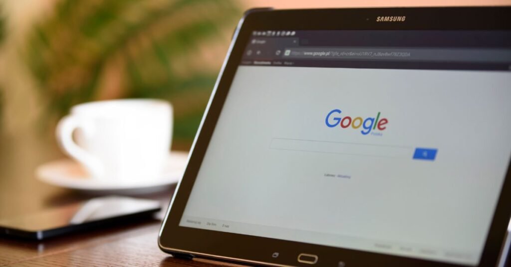 Google search page displayed on a tablet device showing online browsing concept.